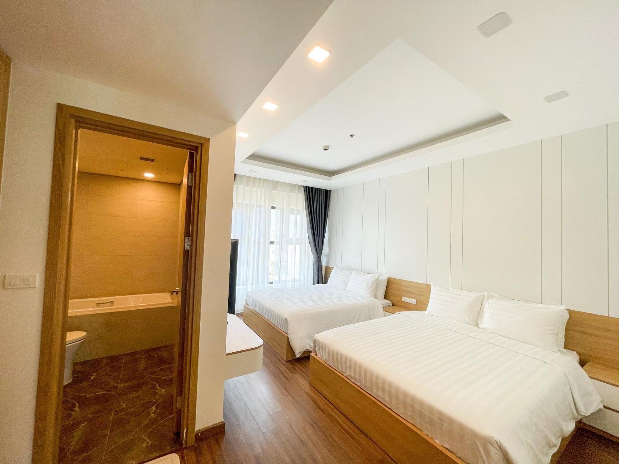St Apartment - Flc Seatower 퀴논 객실 사진